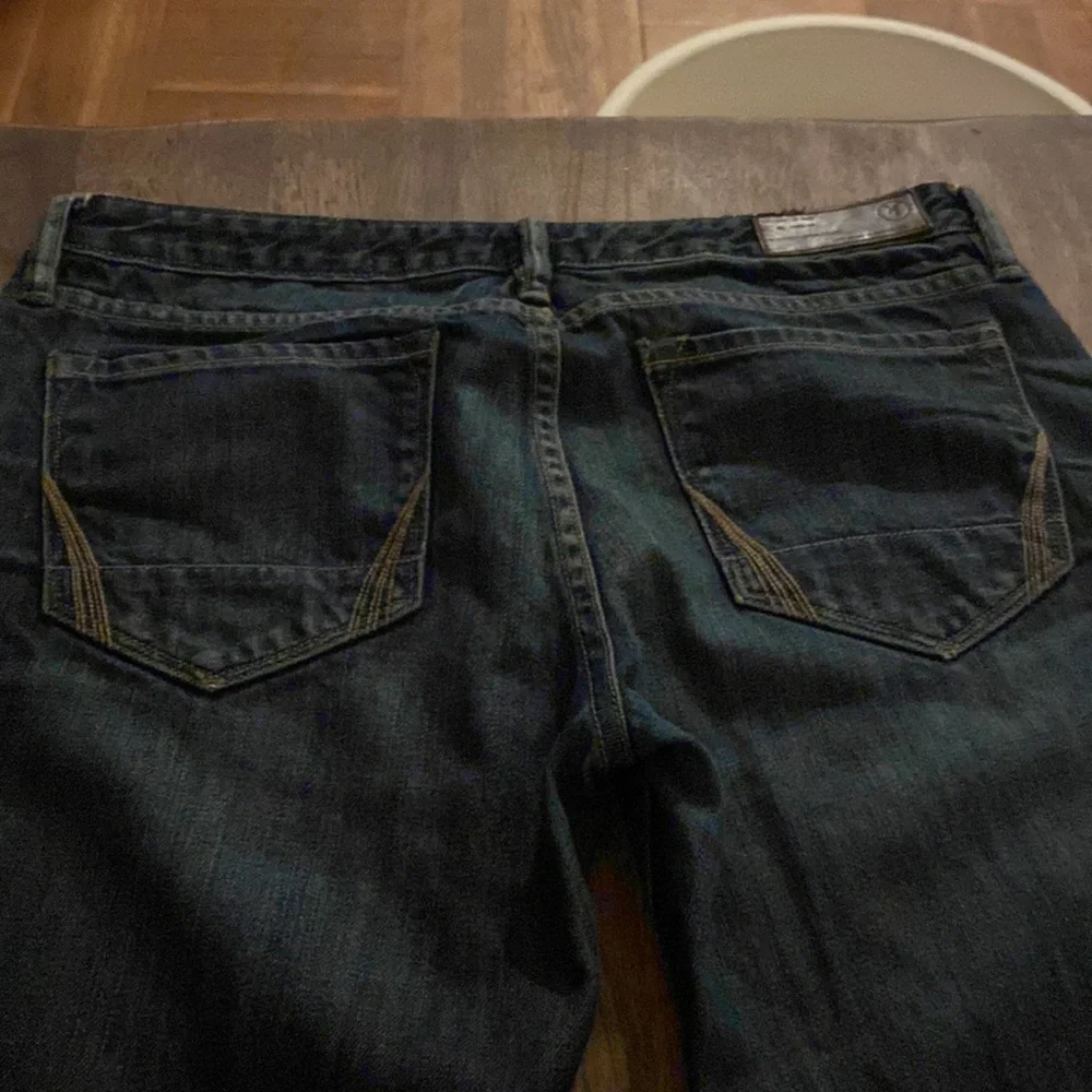 All Saints Spitalfields Jack’s Place skinny dark blue jeans from Neiman Marcus